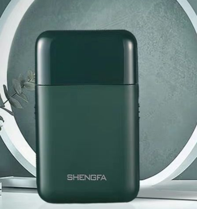 Reciprocating portable electric shaver